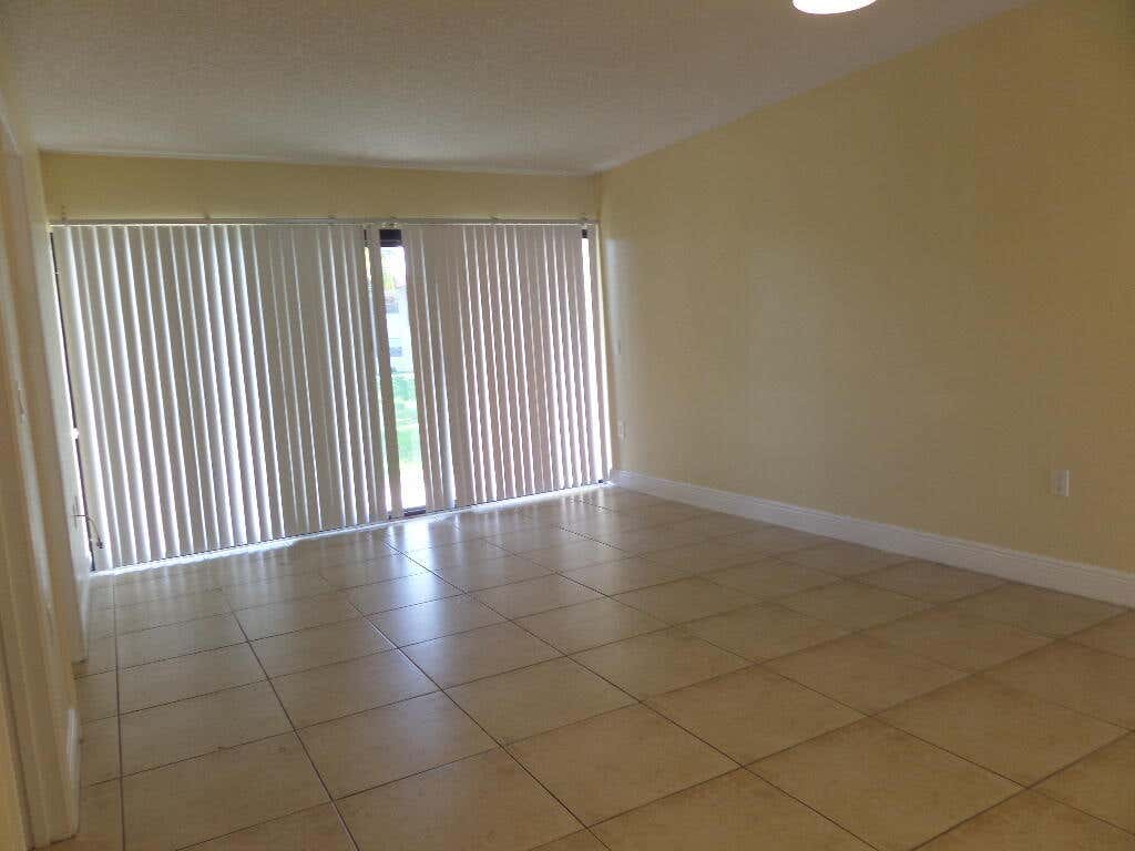 Photo of 1524 LAKE CRYSTAL Drive #B, West Palm Beach, FL 33411 (MLS # B26068089)