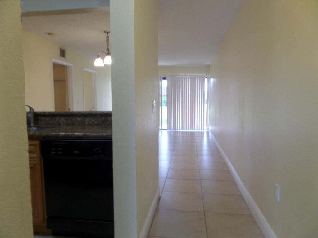 Photo of 1524 LAKE CRYSTAL Drive #B, West Palm Beach, FL 33411 (MLS # B26068089)