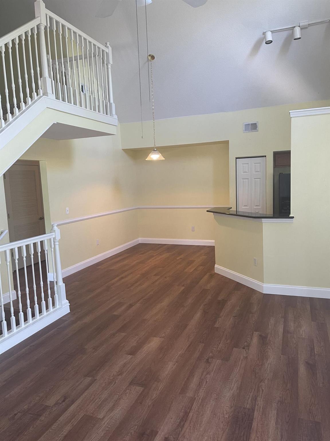 Nicely updated Second Floor Unit, Very Clean, Two large bedrooms and Two baths with walk in closets and a Large Loft that can be a Third room/den/office. Impact Windows for Hurricanes. New Vinyl flooring throughout and New AC, New washing machine. Community has large community pool and fitness center. First, last and security, good credit and income required, NO PETS per Association(Yellow Paint was painted neutral by current tenant, photos from last year). Available 11/1 possibly sooner.
