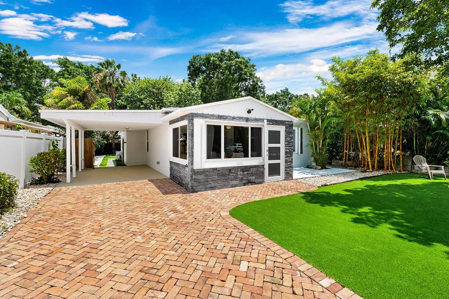 In Croissant Park, mornings begin on your private putting green, coffee in hand, with no mower and no maintenance to worry about. Artificial turf spans both the front and back yards, delivering a clean, polished look year-round and effortless outdoor living. Inside, this 1952 home features a split layout designed for flexibility and privacy. Evenings flow easily from backyard entertaining to a quick drive downtown, to the airport, or the beach. Perfect as a year-round residence, second home, or short-term rental, the low-maintenance design and central location make ownership simple and every stay memorable.