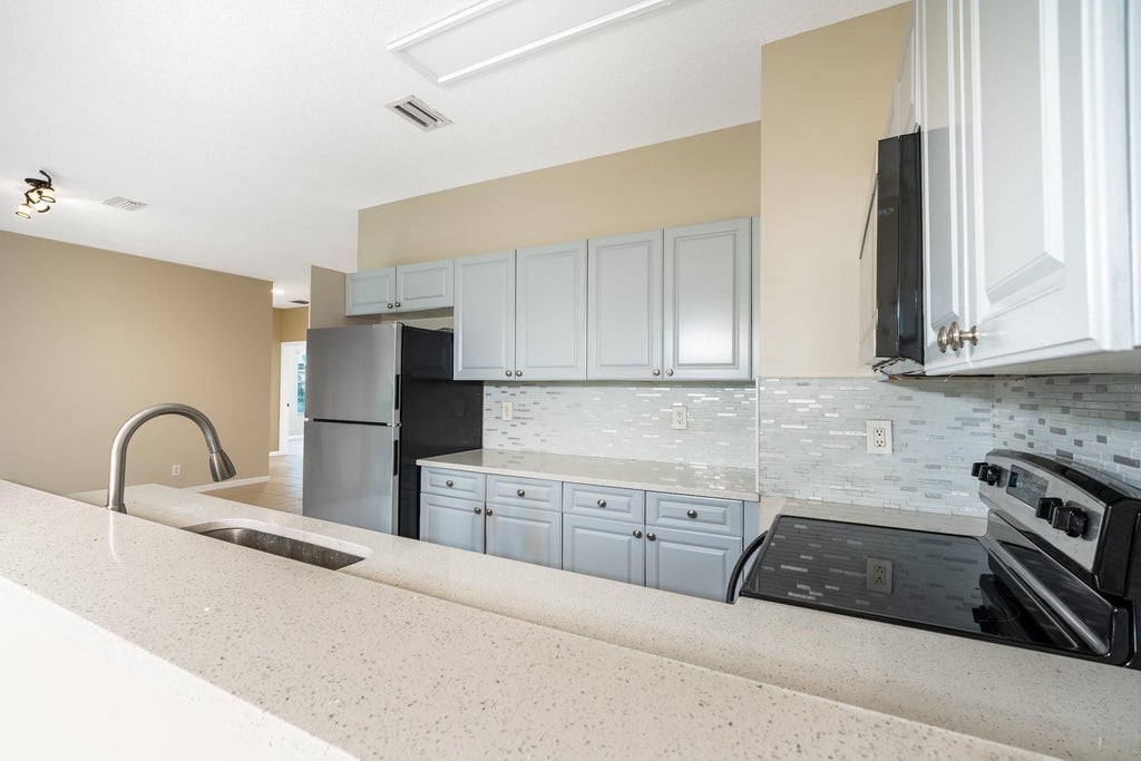 Photo of 1235 NW 27TH Avenue, Pompano Beach, FL 33069 (MLS # B26082571)