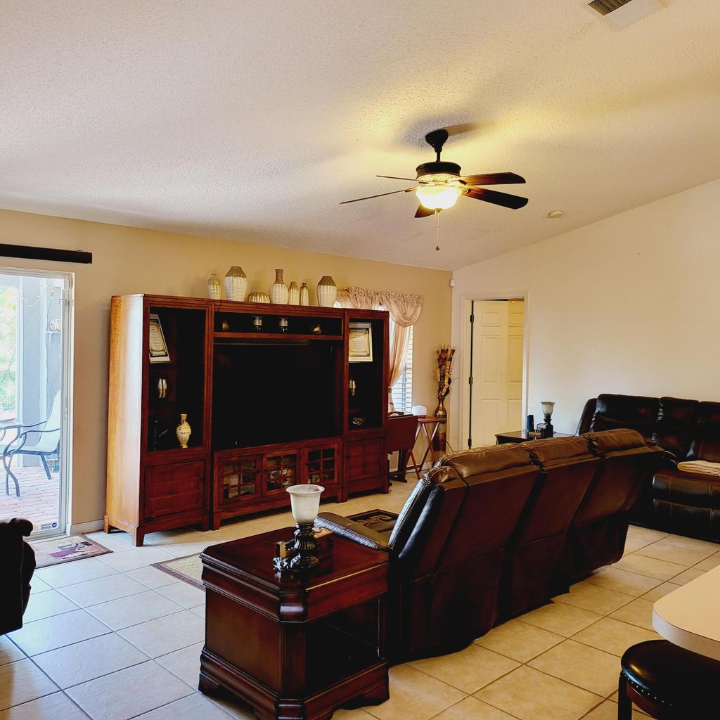 Photo of 538 SW Lairo Avenue, Port Saint Lucie, FL 34953 (MLS # R10985696)