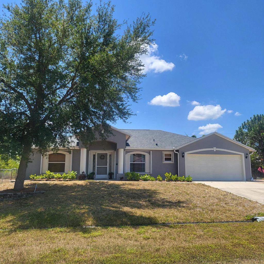 Photo of 538 SW Lairo Avenue, Port Saint Lucie, FL 34953 (MLS # R10985696)