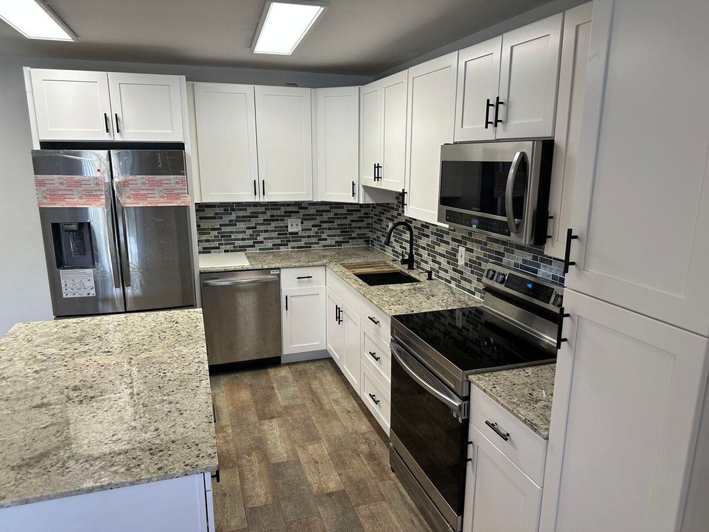 Photo of 3732 Savoy Lane #A1, West Palm Beach, FL 33417 (MLS # R10951055)