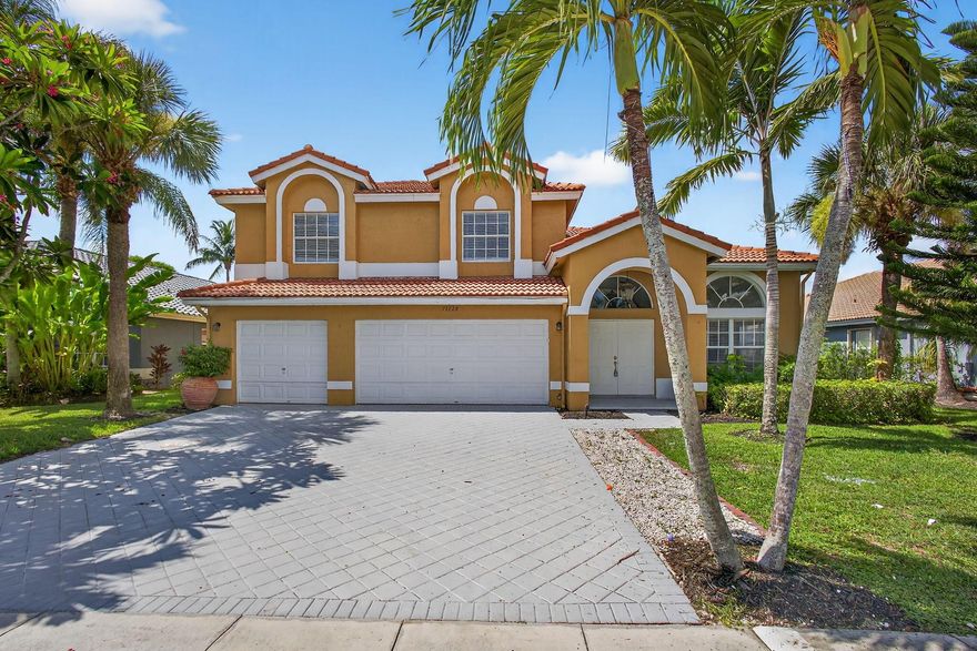 Welcome to your dream home in the heart of Wellington! This beautifully maintained 5-bedroom, 3-bathroom residence offers 2,598 square feet of comfortable living, designed for both relaxation and entertaining. Nestled on a premium lakefront lot, the backyard is a private oasis with tranquil water views and a screened-in patio—ideal for enjoying morning coffee or evening sunsets.

Freshly painted and move-in ready, the home features a recently updated kitchen with stunning new stone countertops that blend elegance and functionality. The open floor plan offers an easy flow between living spaces, perfect for both family gatherings and quiet nights in. The expansive 3-car garage provides ample space for vehicles, storage, or even a workshop setup. New AC System

See supplement Brand new AC System
Situated in a vibrant community with access to a sparkling pool, modern clubhouse, and fully equipped gym, this property has everything you need to enjoy the South Florida lifestyle. Whether you're hosting guests or enjoying a peaceful evening by the lake, this home has the space, upgrades, and location to match your lifestyle. Don't miss your opportunity to own a slice of paradise in Wellingtonschedule your private showing today!