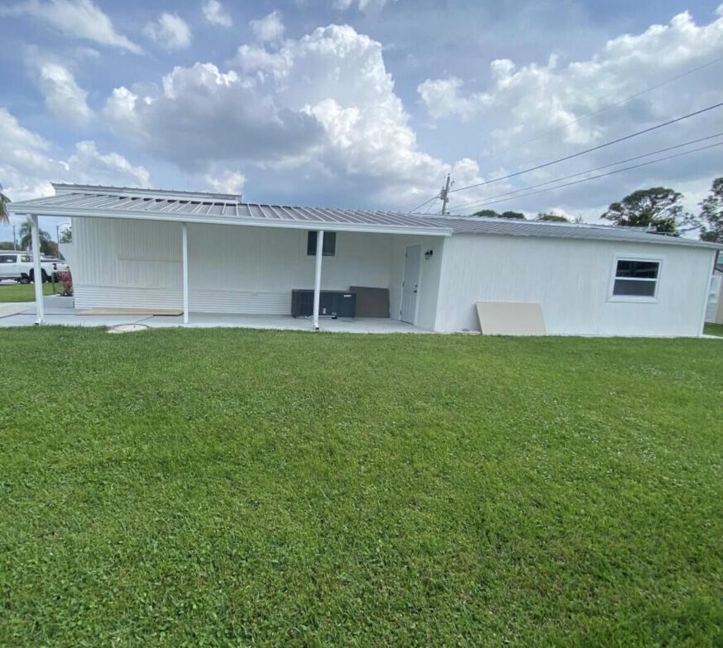 Photo of 92 NE 15th Terrace, Stuart, FL 34994 (MLS # R11122415)