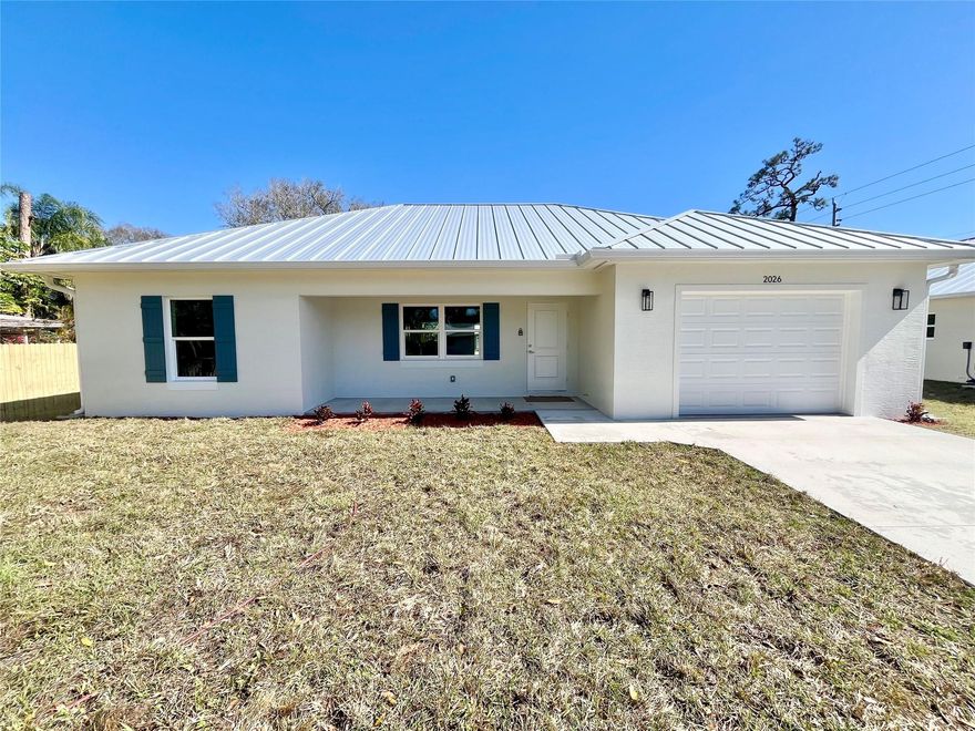 Stunning newly constructed CBS home with 3 bedrooms and 2 bathrooms.  The split floor plan is highlighted by cathedral ceilings and a thoughtfully designed open layout. The kitchen boasts wood cabinetry, quartz countertops, Samsung stainless steel appliance package and an elegant sage green island. This house features 24 gauge standing seam metal roof, impact windows and doors, laminate flooring throughout, and an oversized 1 car garage for plenty of storage. The house sits on a .21 acre lot with paved road frontage minutes away from all the amenities Vero Beach has to offer. NO HOA! See Supplements.