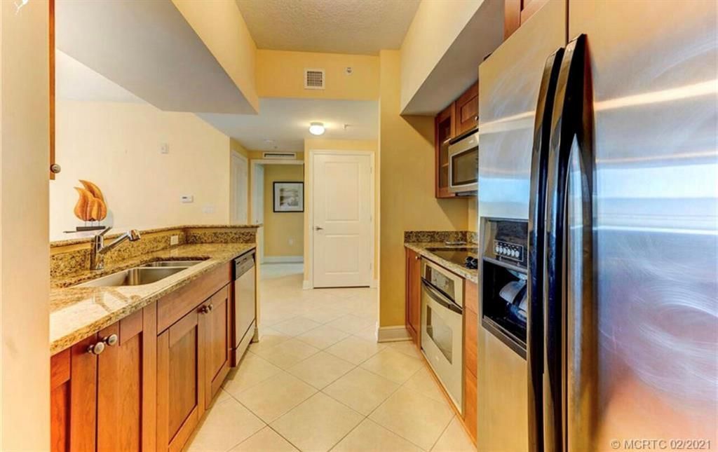 Photo of 975 NW Flagler Avenue #301, Stuart, FL 34994 (MLS # R10879967)