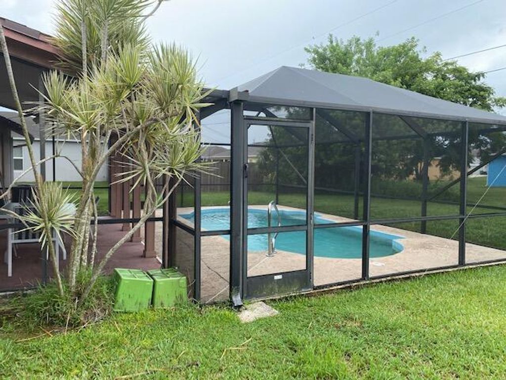 Photo of 3664 SW Parsons Street St, Port St Lucie, FL 34953 (MLS # R10814480)