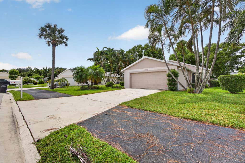 Photo of 1252 PINE SAGE Circle, West Palm Beach, FL 33409 (MLS # B26060862)