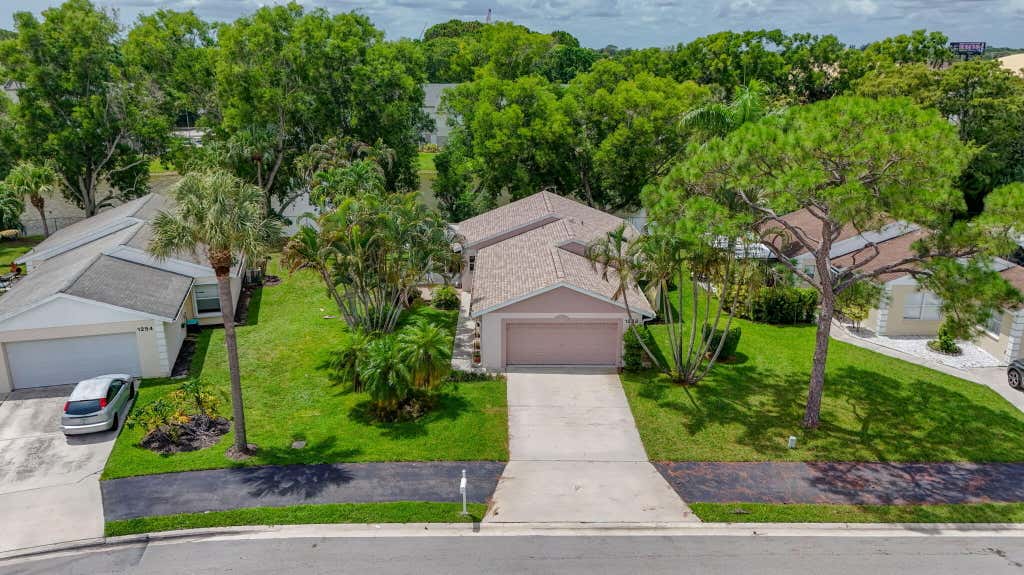 Photo of 1252 PINE SAGE Circle, West Palm Beach, FL 33409 (MLS # B26060862)