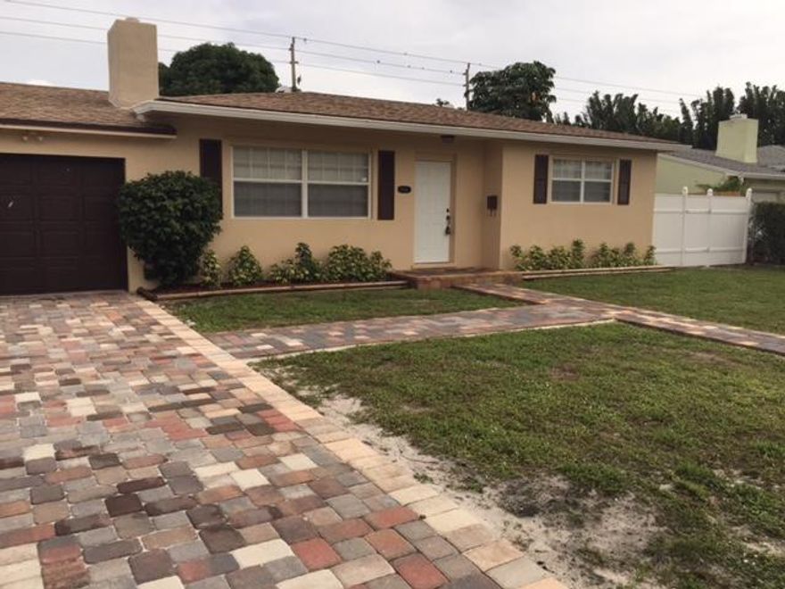 Totally remodeled property, new roof , appliances, sprinkler system, cabinets, counter tops,closets,bathrooms,freshly painted, new driveway, the fire place in working condition, the garage has been converted to a mother in law room, the property lot goes from Martin ave to Olive ave 100x75, pool, mango trees, ready to move, all measures are approximate, very close to the intracostal