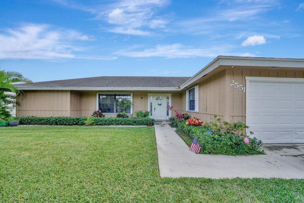 Photo of 2551 Westchester Drive N, Riviera Beach, FL 33407 (MLS # R11078676)