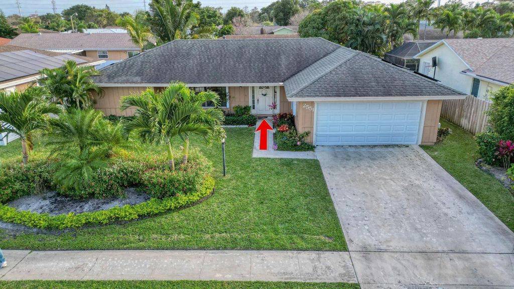 Photo of 2551 Westchester Drive N, Riviera Beach, FL 33407 (MLS # R11078676)