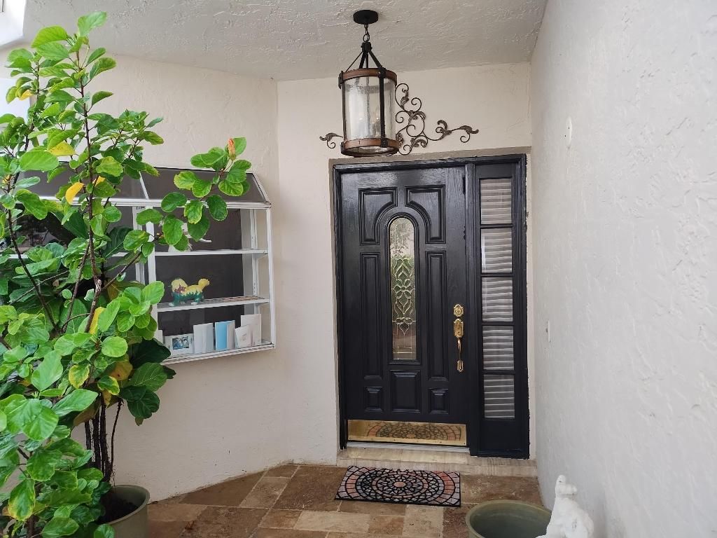 Photo of 906 Dickens Place, West Palm Beach, FL 33411 (MLS # R11134635)