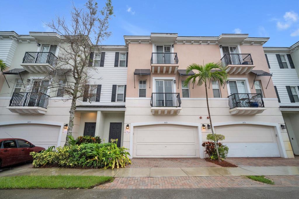 Largest model in Vistazo with driveway! Tri-level townhome 3 bedrooms 3.5 baths w/2 car garage located 1.25 miles to the beach. Granite Countertops, Stainless Steel Appliances, Wood cabinets with a full size washer & dryer. Huge master suite with Jacuzzi tub, walk in closet & balcony. 1st floor bedroom has its own private bath. Enjoy 2 community pools and fitness center.