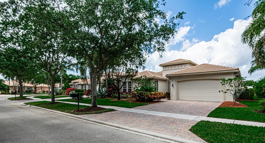 Photo of 7960 Amethyst Lake Point, Lake Worth Beach, FL 33467 (MLS # R10878646)