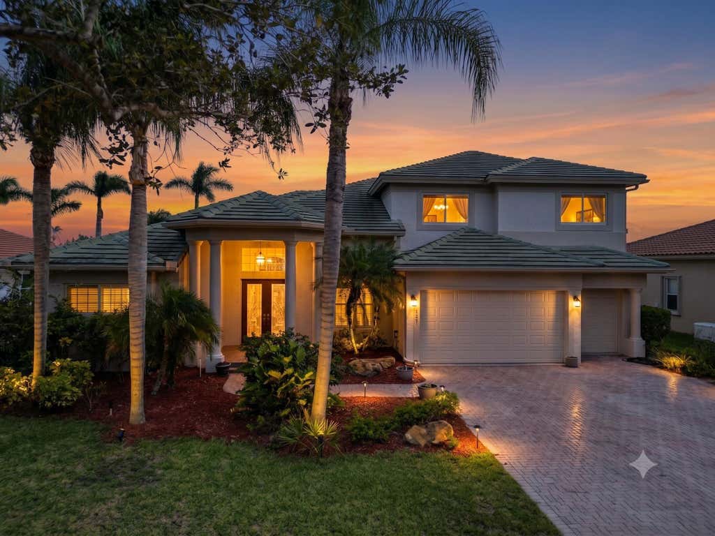 Photo of 2231 SW Manele Place SW, Palm City, FL 34990 (MLS # B26064984)