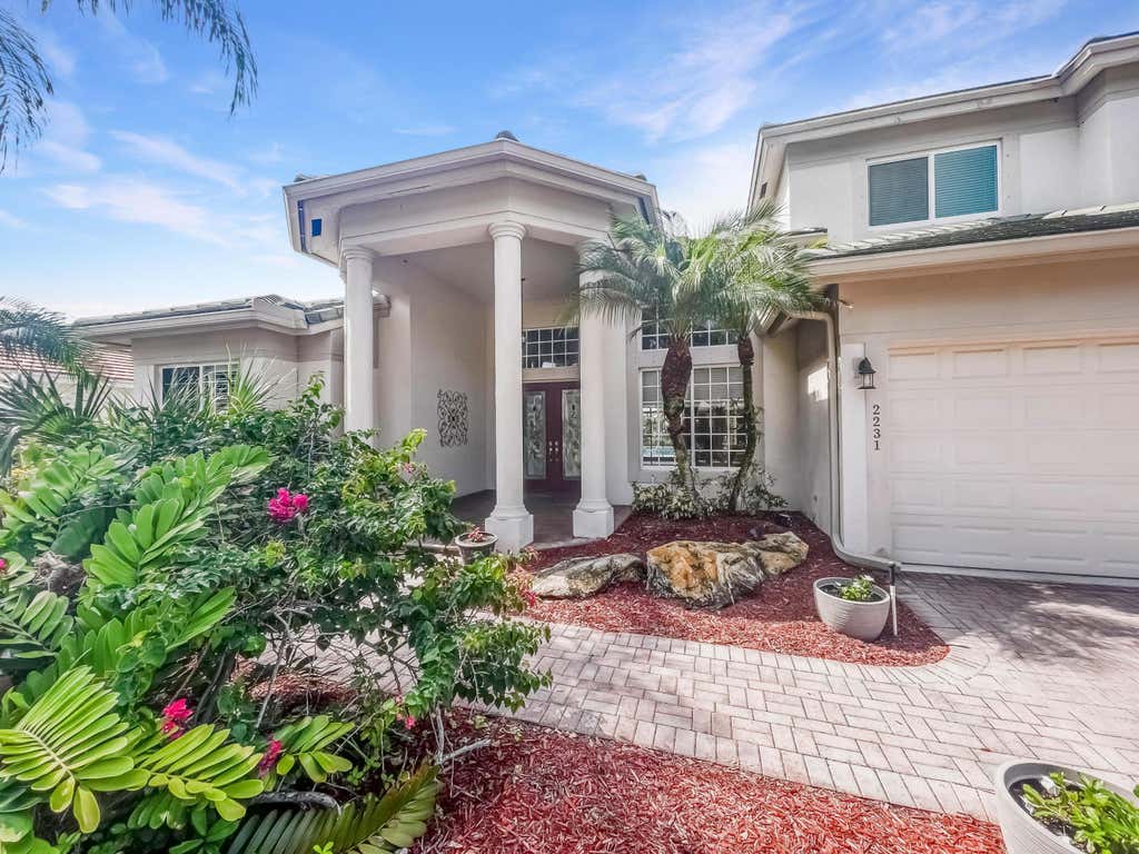 Photo of 2231 SW Manele Place SW, Palm City, FL 34990 (MLS # B26064984)