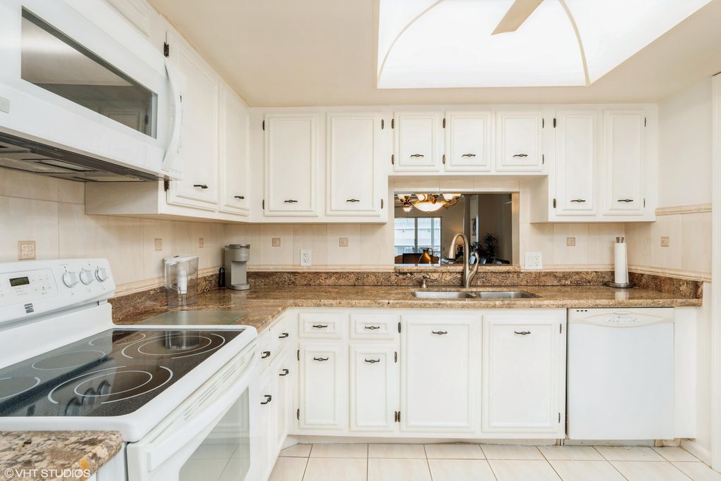Photo of 250 John F Kennedy Drive #408, Atlantis, FL 33462 (MLS # B26026372)