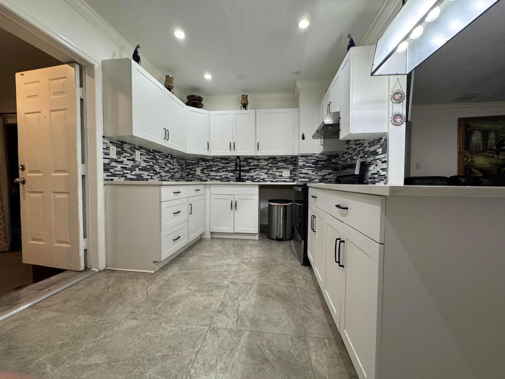 Photo of 1132 NW 7th, Fort Lauderdale, FL 33311 (MLS # B26000917)