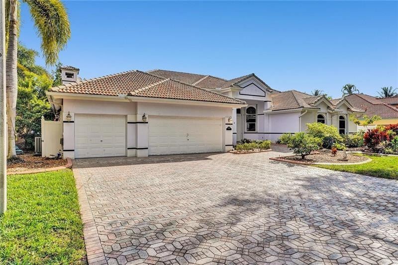 Photo of 2030 SW 62nd Avenue, Plantation, FL 33317 (MLS # B26056438)