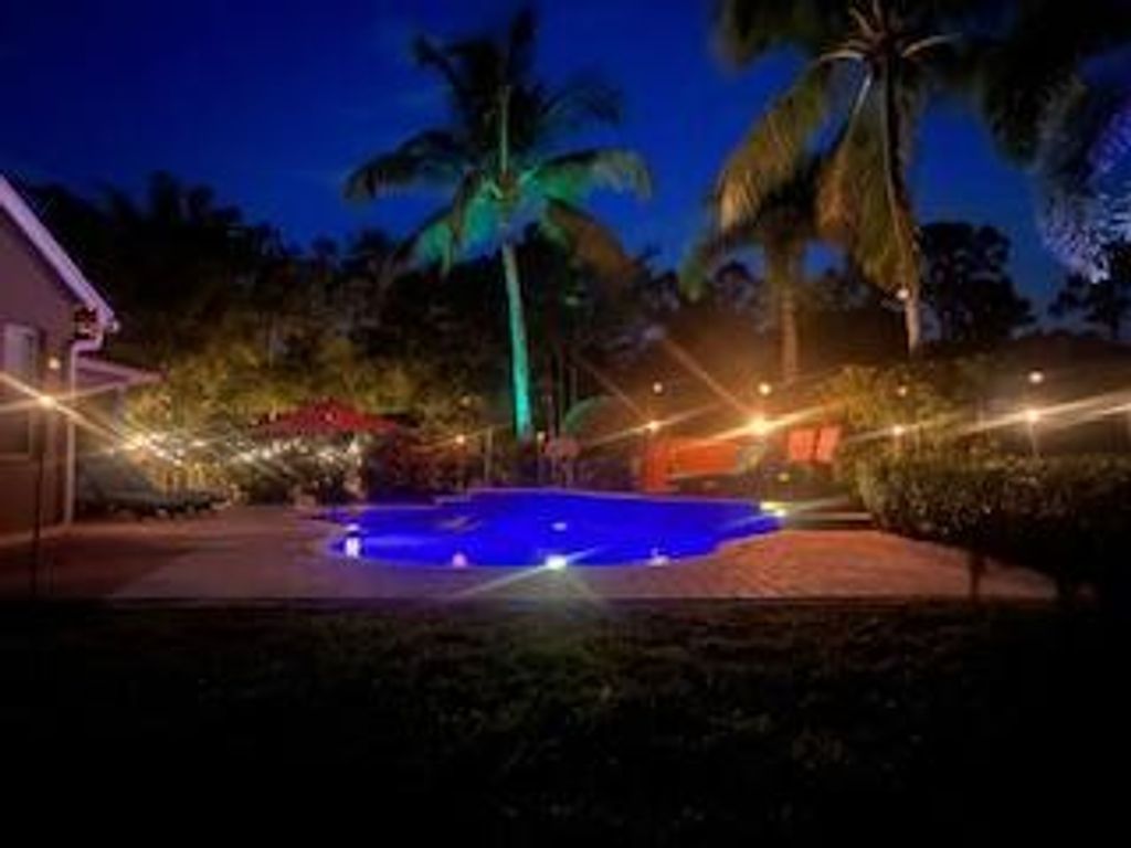 Photo of 16325 75th Place N, The Acreage, FL 33470 (MLS # R10940288)