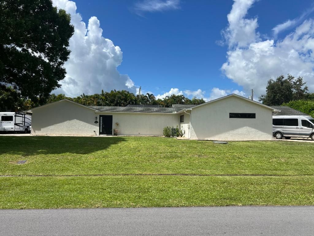 Photo of 1290 SW Fletcher Lane, Port Saint Lucie, FL 34953 (MLS # R11103646)