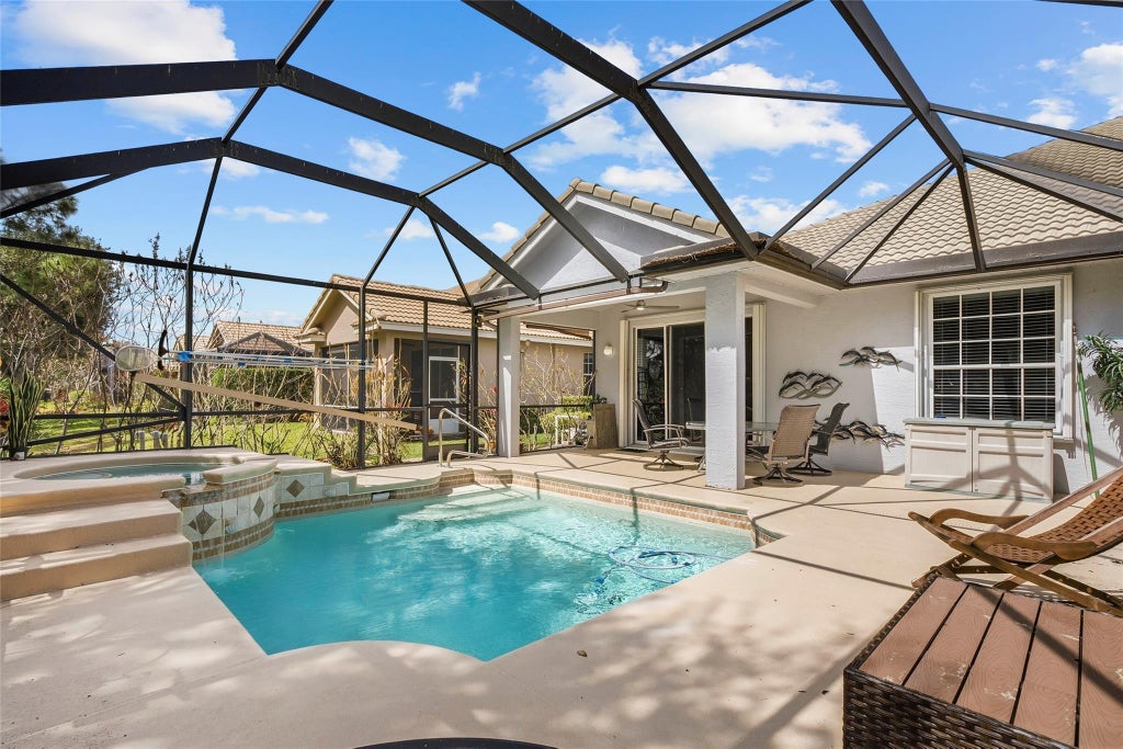 Photo of 730 NW Red Pine Way, Jensen Beach, FL 34957 (MLS # F10554764)