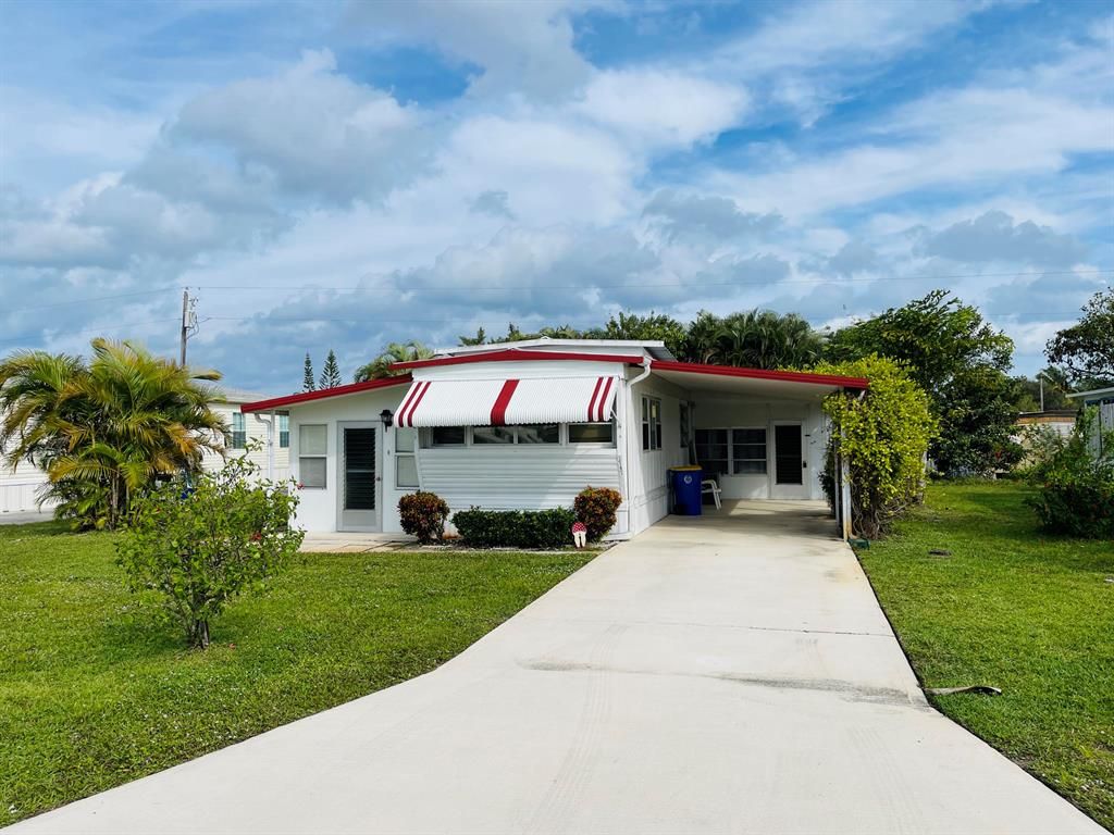 Photo of 7747 SE Swan Avenue, Hobe Sound, FL 33455 (MLS # R10852800)