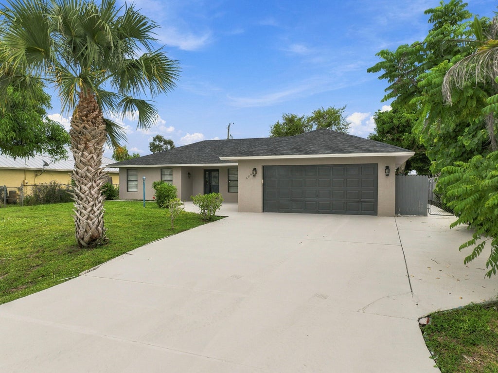 Photo of 680 SW COLLEEN Avenue, Port Saint Lucie, FL 34983 (MLS # B26079658)