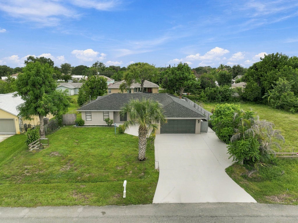 Photo of 680 SW COLLEEN Avenue, Port Saint Lucie, FL 34983 (MLS # B26079658)