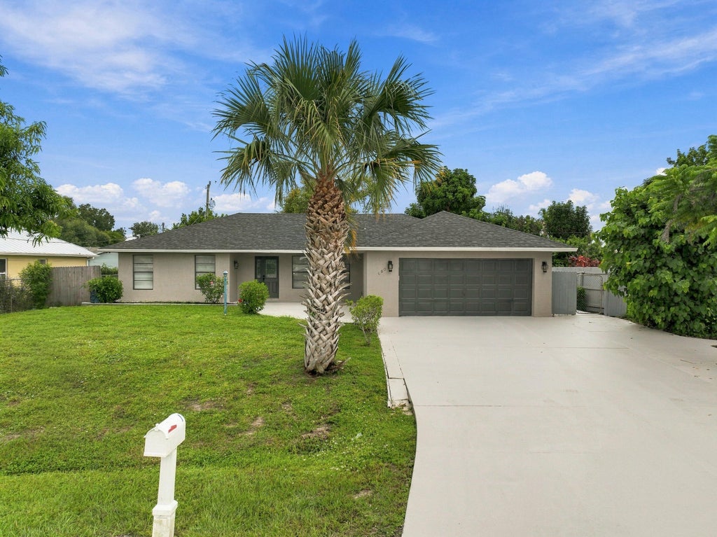 Photo of 680 SW COLLEEN Avenue, Port Saint Lucie, FL 34983 (MLS # B26079658)