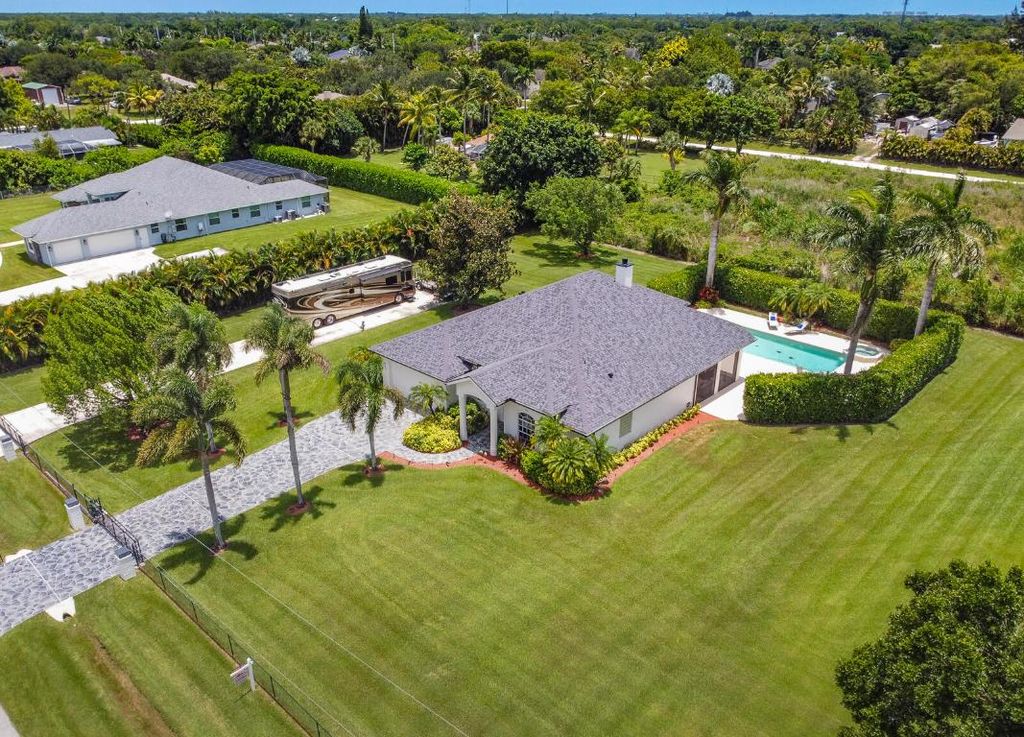 Photo of 16142 76th Trail N, Palm Beach Gardens, FL 33418 (MLS # R11104459)