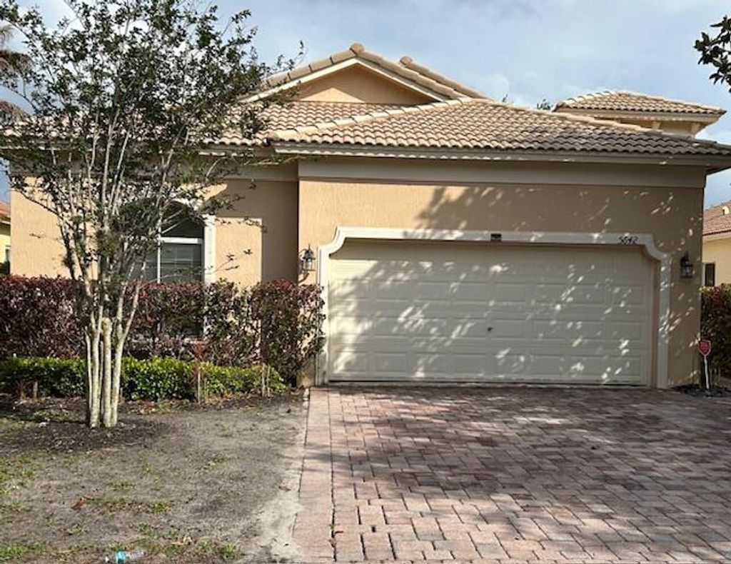 Photo of 5642 Sunberry Circle, Fort Pierce, FL 34951 (MLS # B26018076)