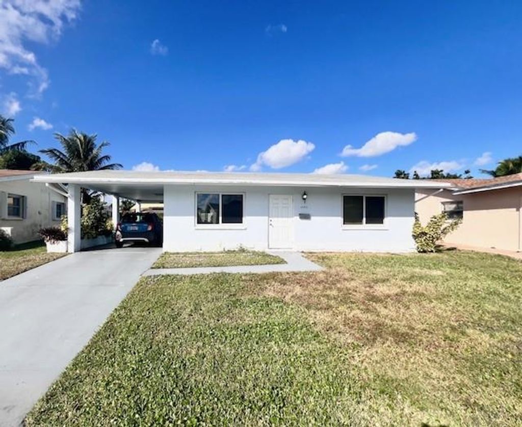Photo of 4503 NW 47th Ct, Tamarac, FL 33319 (MLS # F10538684)