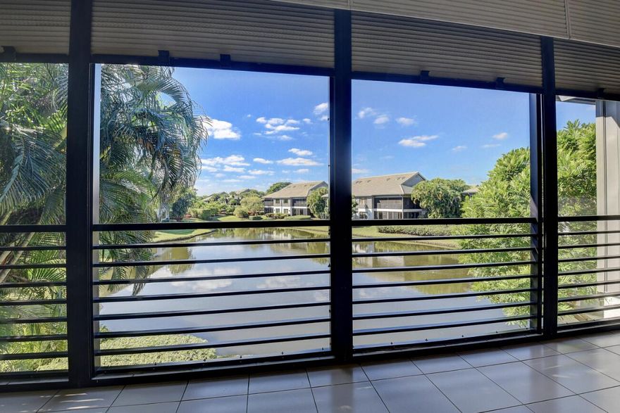 Experience the pinnacle of country club living in this rarely available second-floor residence in Clubside at Boca West. Boasting 3 bedrooms and 2.5 bathrooms, this spacious unit features impressive volume ceilings that create an airy, expansive atmosphere. The highlight of this property is the breathtaking, panoramic vista—enjoy serene, long lake and fountain views from your private living space. Situated within easy walking distance to the main club, you are steps away from world-class amenities. This "diamond in the rough" is poised for a total transformation. Offered as a premier renovation project, it will be meticulously reimagined by BMG Homes, Boca West's premier builder. Don't miss the chance to customize your dream home in the nation's #1 private residential club.