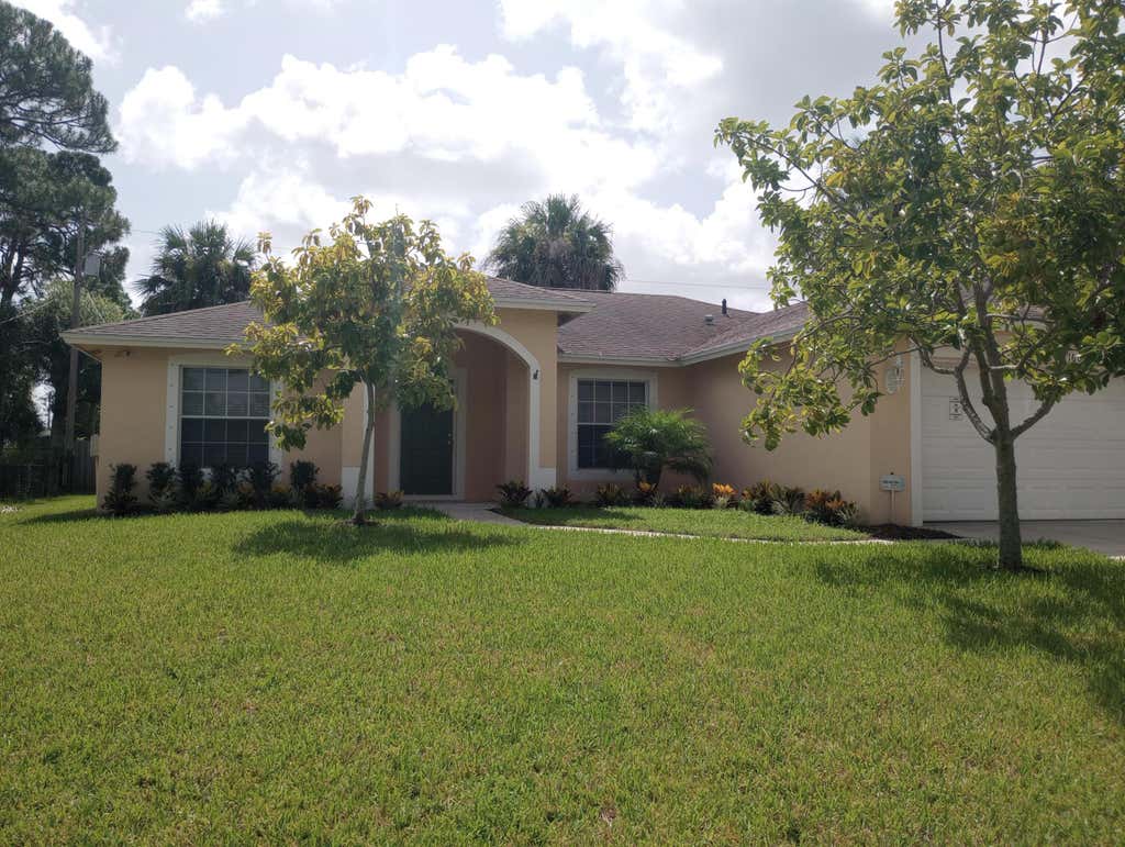 Photo of 1661 SW Salvatierra Boulevard, Port Saint Lucie, FL 34987 (MLS # R11014856)
