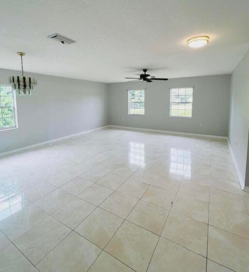 Photo of 2118 SE MORNINGSIDE Boulevard, Port Saint Lucie, FL 34952 (MLS # B26068647)