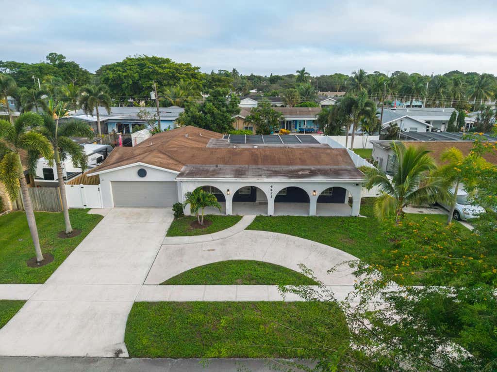 Photo of 4421 NW 2ND Court, Coconut Creek, FL 33066 (MLS # B26056395)