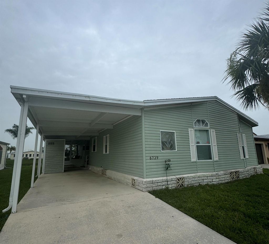 Photo of 6739 Yedra Avenue, Fort Pierce, FL 34951 (MLS # R11096877)