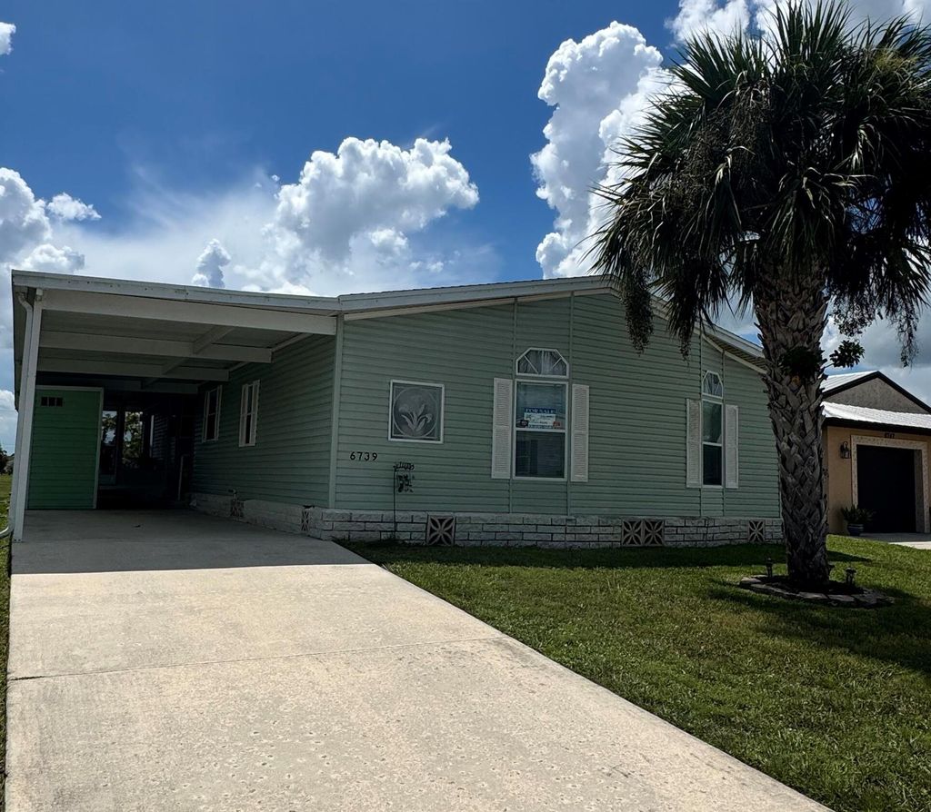 Photo of 6739 Yedra Avenue, Fort Pierce, FL 34951 (MLS # R11096877)