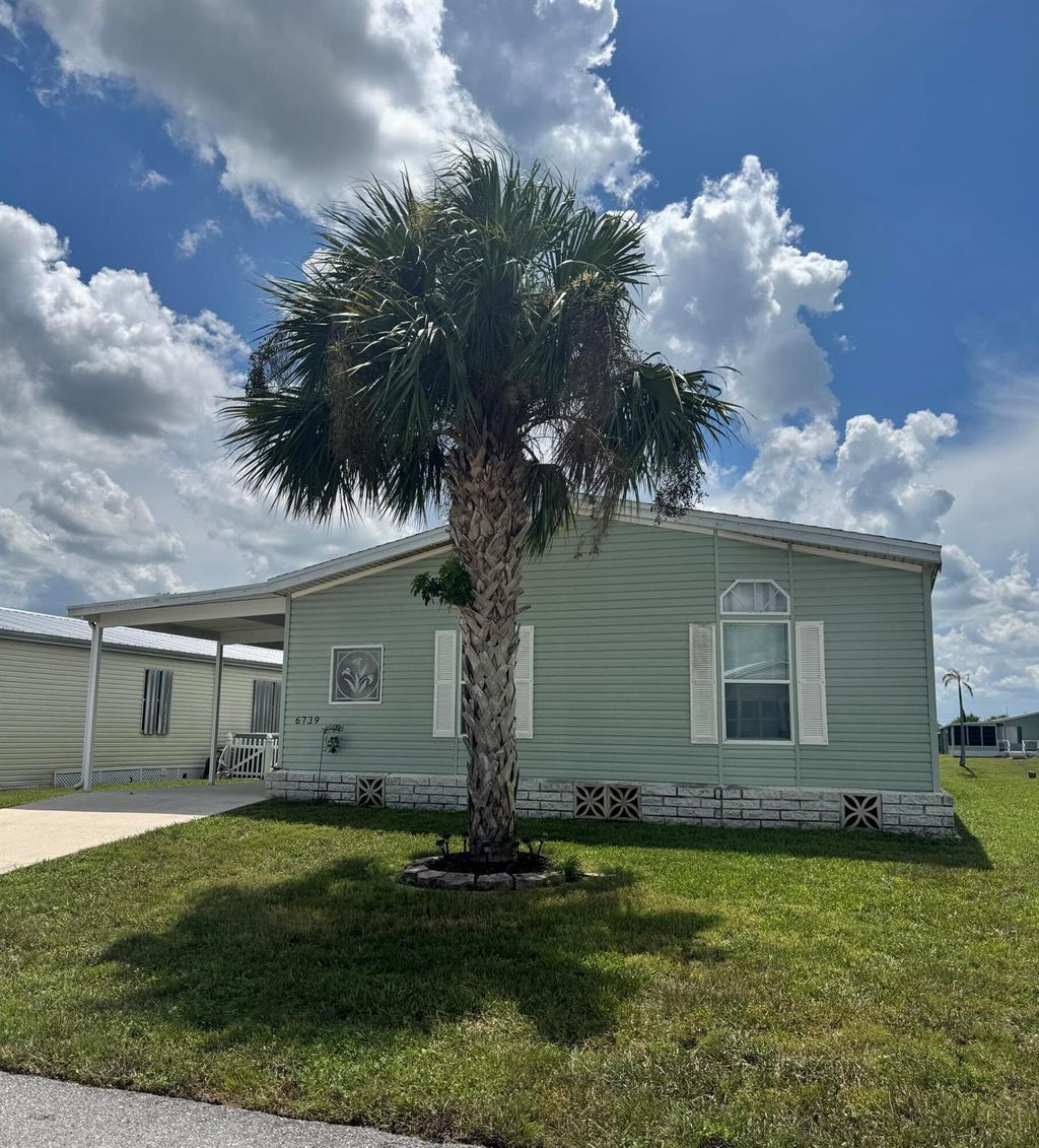 Photo of 6739 Yedra Avenue, Fort Pierce, FL 34951 (MLS # R11096877)