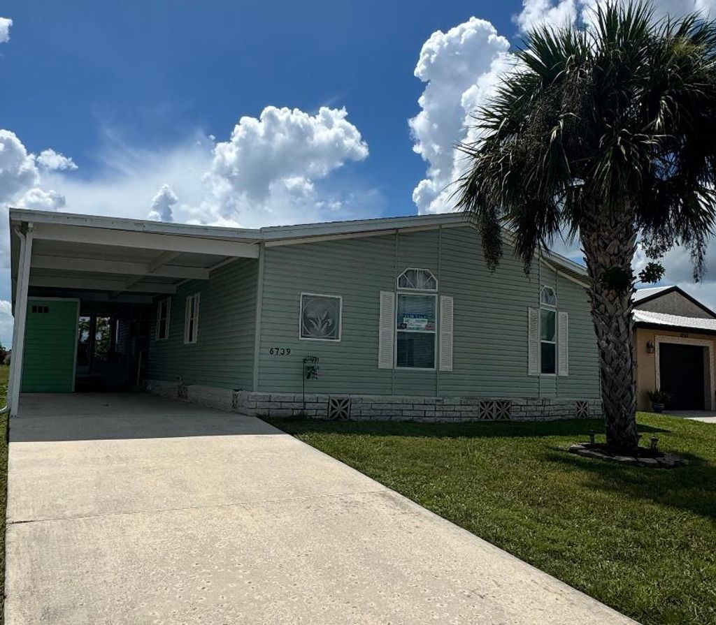 Photo of 6739 Yedra Avenue, Fort Pierce, FL 34951 (MLS # R11096877)