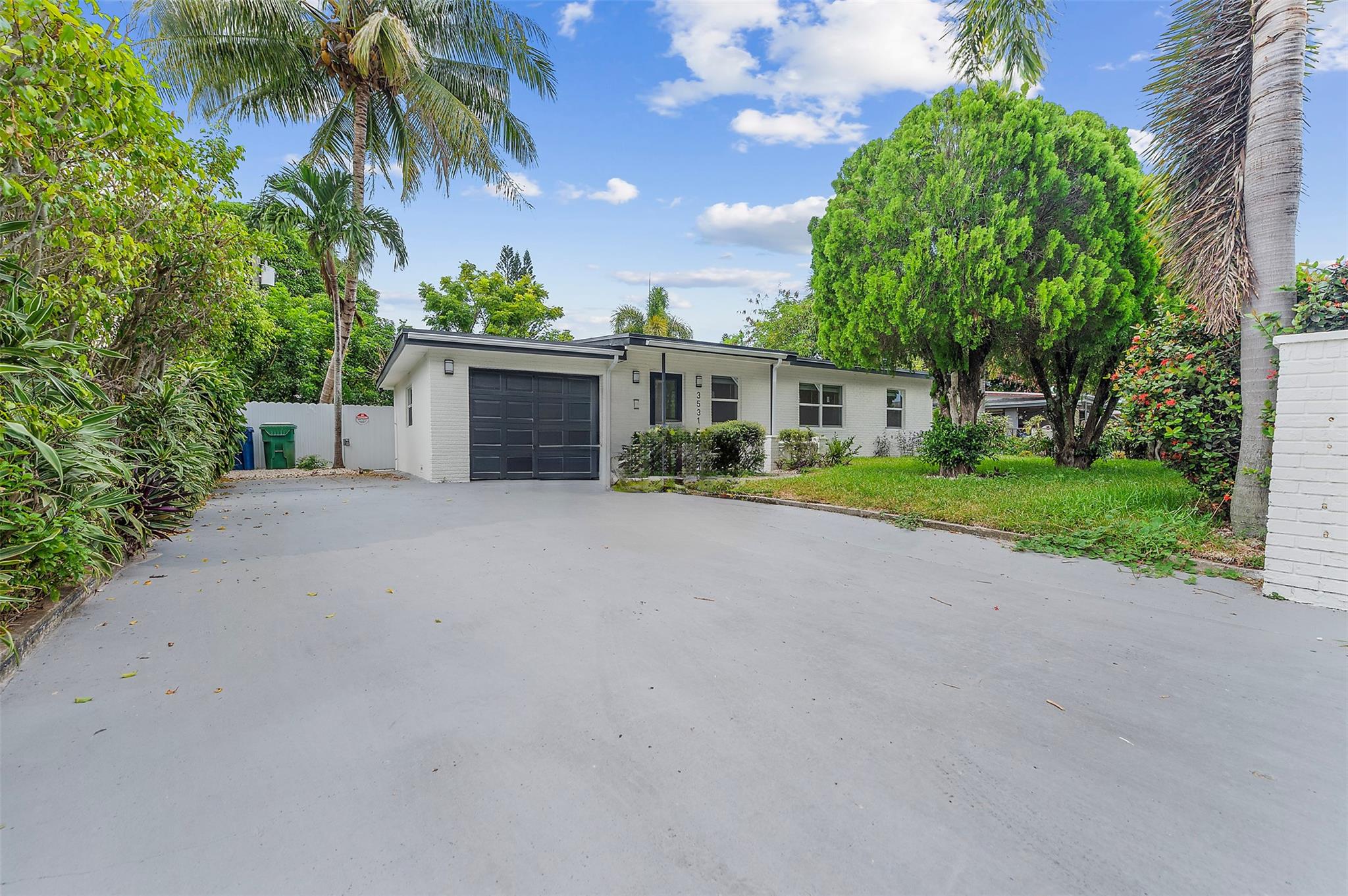 Discover this beautifully renovated, turn-key home in the heart of Fort Lauderdale—an exceptional opportunity for first-time buyers, investors, or those seeking a lucrative Airbnb. Thoughtfully redesigned with modern finishes, this four-bedroom residence boasts a brand-new roof, impact-resistant doors and windows and an expansive backyard creating the perfect private oasis in sunny South Florida. The spacious concrete driveway offers ample room for a boat or RV, adding to the home’s versatility. Nestled in a centrally located family neighborhood surrounded by well-maintained homes, this property combines style, comfort, and convenience. Just minutes from Fort Lauderdale Airport, it’s move-in ready and primed for immediate enjoyment or rental income. Don’t miss this rare find!