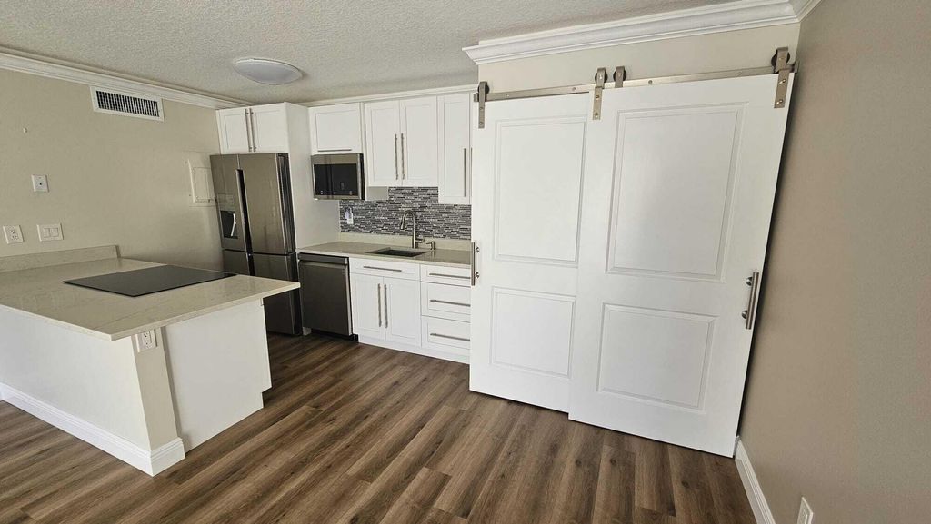 Photo of 647 Executive Center Drive #S101, West Palm Beach, FL 33401 (MLS # R10975722)