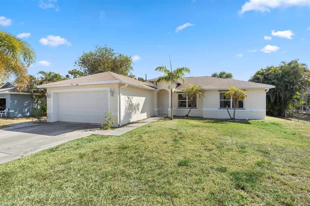 Photo of 2537 SW Deckard Street, Port Saint Lucie, FL 34953 (MLS # R10690683)