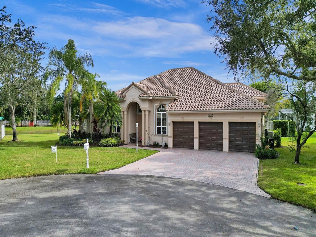 Photo of 16242 Cayuga Circle, Davie, FL 33331 (MLS # F10408551)