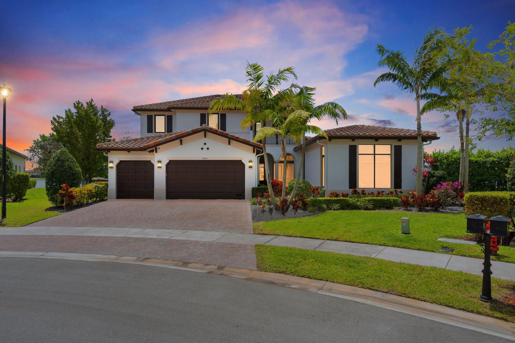 Experience resort-style living in this exquisite 6-bed, 5.5-bath CC Homes Chateau model in MiraLago. Set on a rare pie-shaped lakefront lot with 144 ft of water views, this masterpiece boasts soaring ceilings, a grand open layout, and a designer kitchen with an oversized island. The luxurious primary suite features a spa-quality bath and custom-built closet. The only home in MiraLago with casement windows, it also includes a private extended casita perfect for guests, teens, or in-laws. Upstairs offers wood floors, 3 beds, 2 baths (Jack & Jill), and a sleek loft with glass railing. Enjoy the screened lanai, heated pool, 3-car garage, and 6-car driveway. Access world-class MiraLago & Cascata amenities, pool, gym, tennis & more!