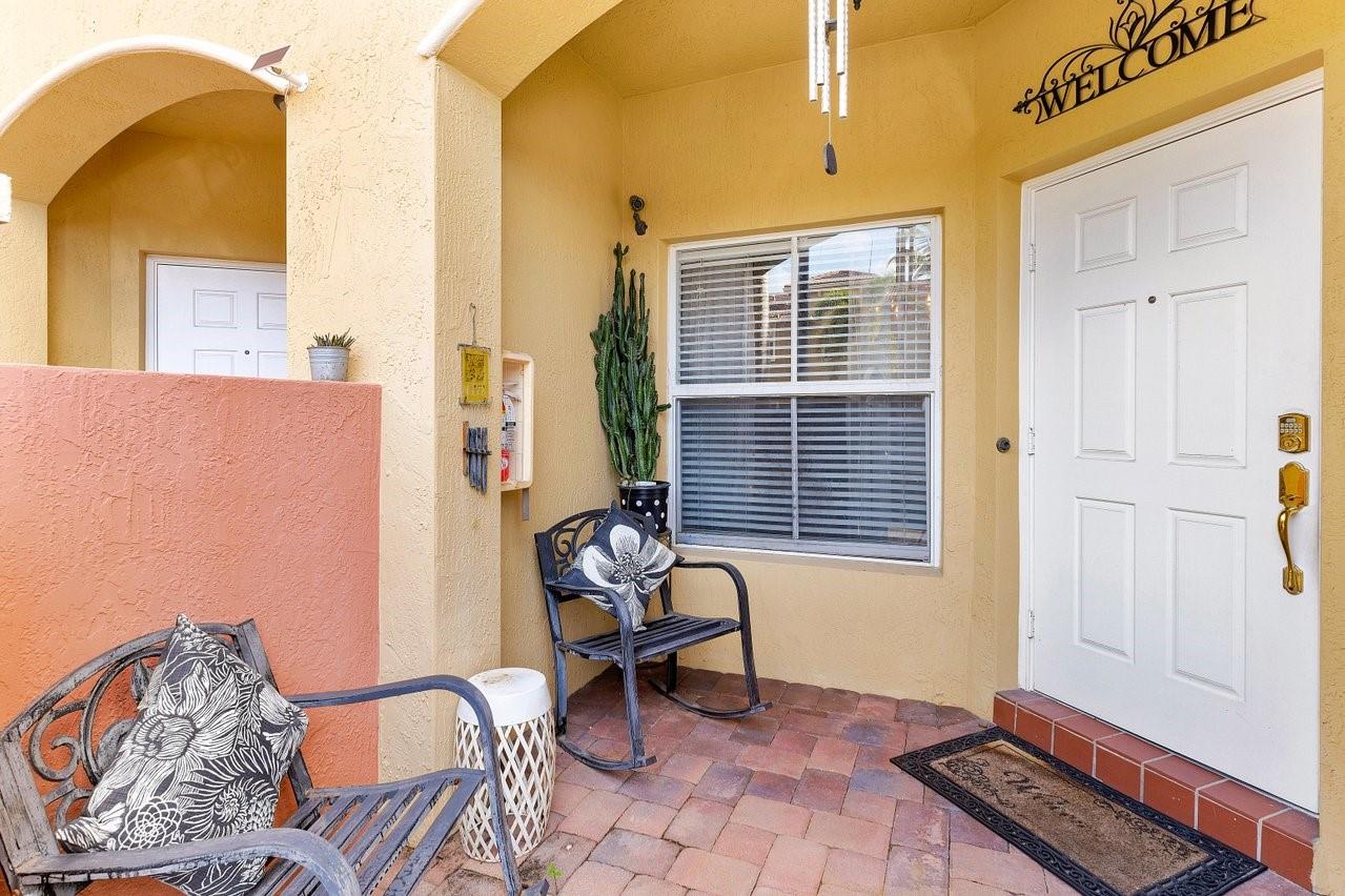 *SELLER MOTIVATED* Designer's Delight! Charming, well-maintained townhome in gated Tamarac community. Steps from Ft. Lauderdale's best! Enjoy designated owner parking + ample guest spots located directly in front of the unit, new roof, Pet friendly community, and private back patio. Ideally located near beaches, highways, and private airport. Features include a walk-in terrace, high ceilings, and a spacious living area. Community pool! Near the stadium & Executive Airport. A must-see!